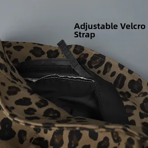 Detail view of leopard print bucket hat featuring adjustable black velcro strap inside