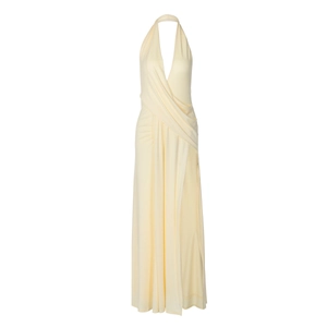 Detail of butter yellow halter dress featuring a deep V-neckline and waist pleats