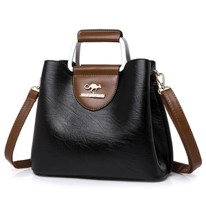 Chic black PU leather tote bag with brown handles and gold logo shown on white background