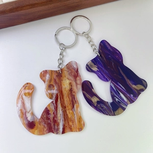 Minimalist gradient acrylic cat keychain pair with marble texture and metal rings