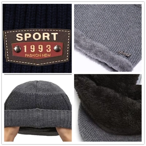 Winter beanie and scarf set featuring thick fleece lining and classic leather sport label