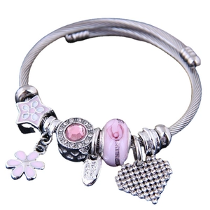 Bohemian silver bangle with pink enamel flower heart charms and sparkling rhinestones