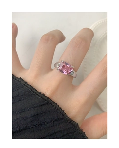 Close-up of S925 silver ring featuring a large rectangular pink zircon on a hand