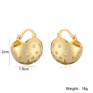 Macro shot of gold-plated geometric sphere earrings with cubic zirconia and size dimensions