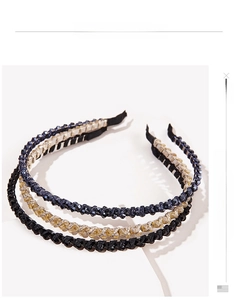 Detail showing handcrafted crystal beaded headbands in black, champagne, and navy blue