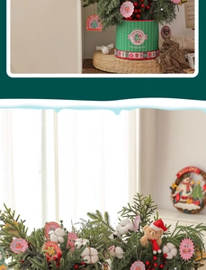 Close-up of a Christmas tree tabletop decoration with red berries and a small plush bear