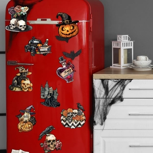Close-up of Halloween gnome and skull magnets on a red vintage refrigerator door