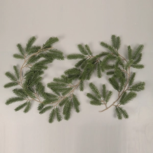 Detailed view of realistic dark green PE artificial pine needles for Christmas decor