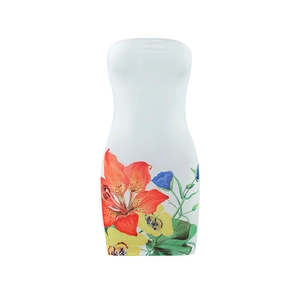 Detailed view of white strapless mini dress with vibrant red and blue floral print patterns