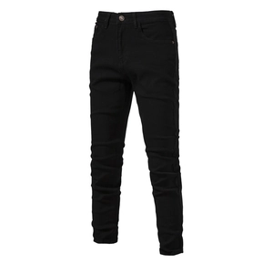 Detail shot of men's slim fit black denim jeans showing classic five-pocket design
