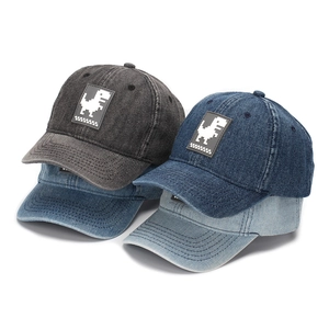 Kids denim baseball caps with pixel dinosaur patches in four assorted blue washes