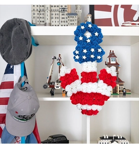 Detail of anchor-shaped foam wreath with white stars in red, white and blue flag colors
