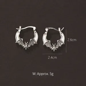 Vintage silver vampire bat earrings in gothic style with detailed wings for Halloween