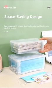 Macro shot showing the stackable lid design of a clear large plastic mask storage box