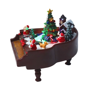 Détail boîte à musique piano de Noël marron avec lumières LED et figurine Père Noël