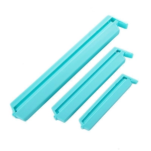 Set of 3 candy-colored plastic food sealing clips in various sizes for kitchen storage
