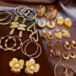 Chic multi-layered geometric heart and circular gold earrings with vintage minimalist style