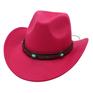 Detailed view of rose red cowboy hat with turquoise beads and metal studs on leather band
