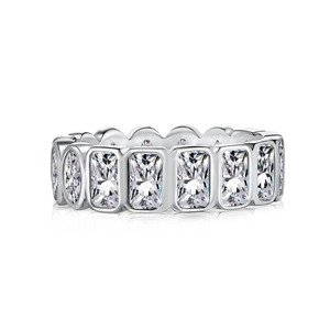 Exquisite S925 sterling silver eternity ring with emerald cut pavé set gemstones