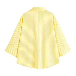 Women's yellow vertical striped shirt with casual loose fit and drop shoulder design