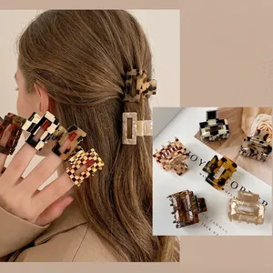 Acetate square hair claws featuring leopard print and checkerboard patterns for women