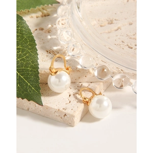 Elegant S925 sterling silver hoop earrings with round white pearls and gold accents