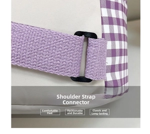 Detail of purple woven shoulder strap and black D-ring buckle on kids backpack
