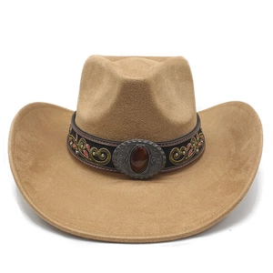 Detail of floral embroidery and vintage oval metal buckle on a suede cowboy hat