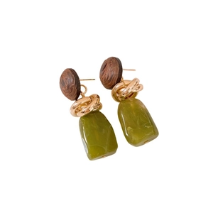 Retro geometric earrings with brown wood, golden rings, and green resin pendants