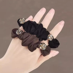 French camellia heart hair scrunchies in black and brown with sparkling rhinestones