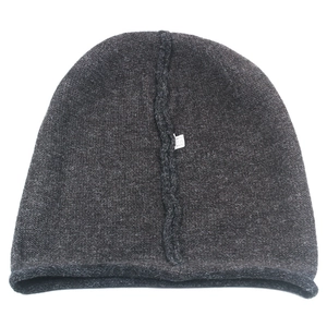 Winter rabbit fur knit beanie in charcoal grey featuring warm rolled edges and thick texture