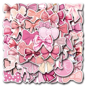 Close-up of various pink coquette bow stickers with white borders for DIY decoration