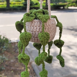 Handmade crochet hanging plant car ornament with green heart-shaped leaves for rearview mirror