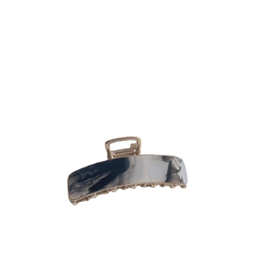 Rectangle acetate hair claw clip with marble texture and gold-tone metal frame