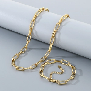 Two-tone gold and silver twist link chain necklace and bracelet set in stainless steel