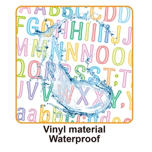 Macro shot of colorful waterproof vinyl alphabet stickers with water splash effects