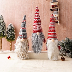 Three-piece knitted Christmas gnome wine bottle covers with snowflakes and plush beards
