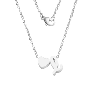 Detail of silver stainless steel heart pendant and letter L charm with lobster clasp
