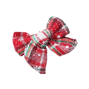 Nœud de cheveux de Noël rouge avec motifs flocons et rayures festives pour filles