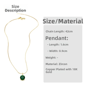 Detail of 18K gold plated necklace featuring 42cm chain and 1.6cm green zircon pendant
