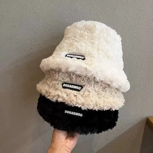 Detailed comparison of white, beige, and black plush winter bucket hats in soft faux fur