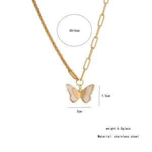 Detailed specs of gold butterfly necklace with shell wings and asymmetric chain