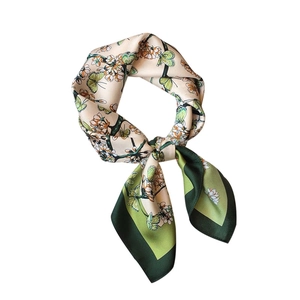 Elegant silk-like scarf with green butterfly and floral prints on a beige background
