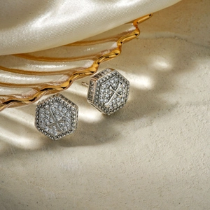 Stylish silver hexagon stud earrings with micro-set zircons and central cross motif