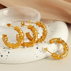 Luxurious C-shaped 18K gold plated titanium earrings with pearls and zircon stones