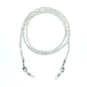 Detail of white beads and silver metal clasp on a versatile eyeglass and mask chain