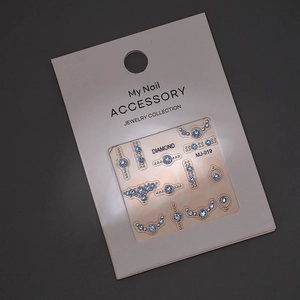 Detail of blue K9 crystal nail art stickers with metallic gold edging, model MJ-019