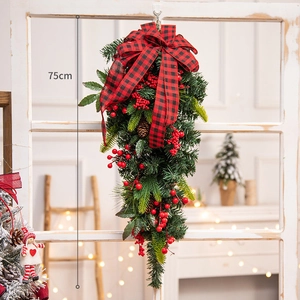 75cm Christmas swag with red plaid bow, pine needles and berries on a vintage window