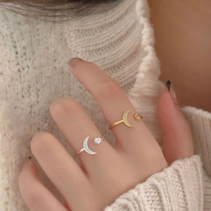 925 silver star and moon open ring with shimmering cubic zirconia on female hand