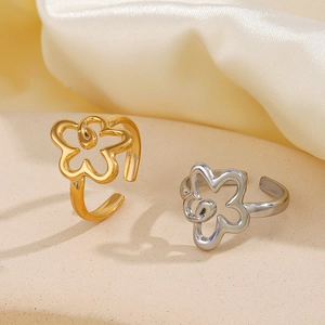 Exaggerated stainless steel cutout flower rings in gold and silver finish with open band